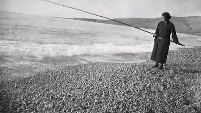 A woman fishing in Jounieh, Lebanon, in 1928 makes for a stark portrait by the amateur photographer Marie El Khazen. Photographer: Marie El Khazen. Collection: AIF/Mohsen Yammine.