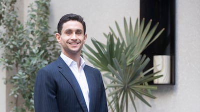 Omar Fayed, pictured in Dubai's financial district, said he has been inspired by the work the Emirates is doing in space exploration and eco-tech. Ruel Pableo / The National