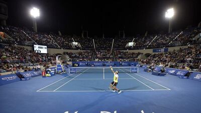 Rafael Nadal serves to David Ferrer. Ali Haider / EPA