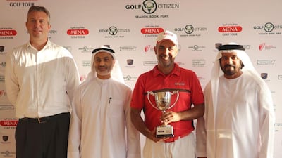 Spain's Carlos Balmaseda with the winner's trophy on September 21, 2016. Courtesy Mena Golf Tour