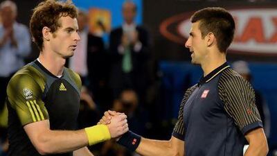 Sunday's Wimbledon men's final will be the fourth time Novak Djokovic, right, and Andy Murray have met in a grand slam final. Paul Crock / AFP