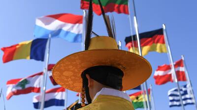 Musicians take part in a welcoming ceremony for Germany's Olympic team at the Olympic Village in Pyeongchang ahead of the 2018 Winter Olympic Games. Kirill Kudryavtsev / AFP