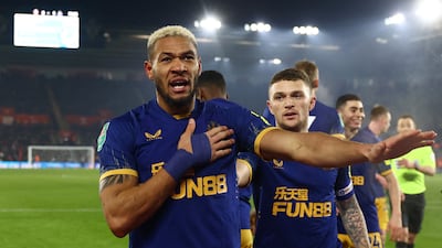 Newcastle United's Joelinton celebrates with Kieran Trippier after scoring in the 1-0 League Cup semi-final win against Southampton at St Mary's Stadium on January 24, 2023. Reuters