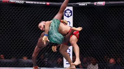 Leon Edwards and Belal Muhammad in action during their welterweight title bout. PA