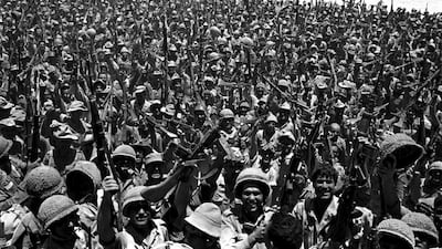 Israel troops wave their guns around in June 1967 after having made it to the Sinai deserts of Egypt. AP Photo