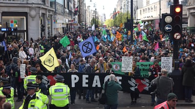 Extinction Rebellion protesters gather in Oxford Circus to begin their Spring 2022 UK Action. Getty.