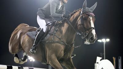 Miriam Schneider rides Benur Du Romet at Fatima bint Mubarak International Showjumping competition. Reem Mohammed / The National