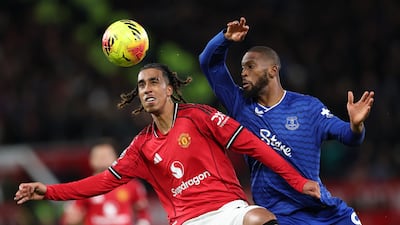 Leny Yoro of Manchester United, left, in action against Beto of Everton. EPA