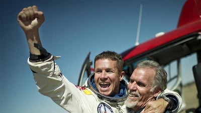 Felix Baumgartner, seen celebrating after successfully completing the final manned flight for Red Bull Stratos in 2012, died on Thursday in a paragliding accident in central Italy. Reuters