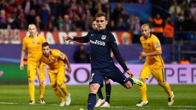 Antoine Griezmann of Atletico Madrid scores from the penalty spot for his team’s second goal during the Uefa Champions League quarter-final, second leg match between Atletico Madrid and FC Barcelona at the Vincente Calderon on April 13, 2016 in Madrid, Spain. (Photo by Mike Hewitt/Getty Images)
