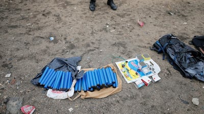 Explosive materials and other recovered items. Reuters