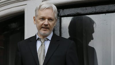 WikiLeaks founder Julian Assange speaks from the balcony of the Ecuadorean embassy in London on February 5, 2016. Sweden's top prosecutor on May 19, 2017. dropped an investigation into a rape claim against Mr Assange after almost seven years. Kirsty Wigglesworth / AP, file