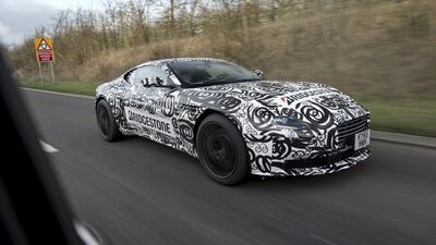 A disguised Aston Martin DB11, undergoing pre-production testing.