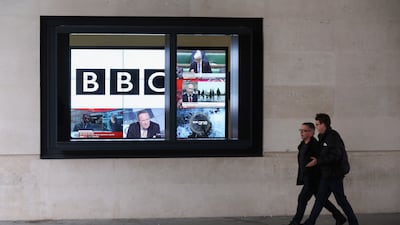 A bank of television screens displaying BBC channels at the BBC headquarters in London. Getty