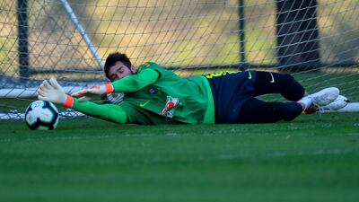 Brazil goalkeeper Alisson makes a save. EPA