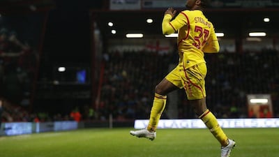 Raheem Sterling of Liverpool celebrates scoring against Bournemouth in his side's League Cup quarter-final victory on Wednesday. Andrew Winning / Reuters / December 17, 2014