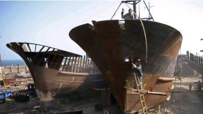 Welders work at a shipyard in Jinjiang, in southeast China's Fujian province, Thursday, Oct. 29, 2009. China's shipbuilding industry, the world's largest, is seeing a resurgence in business following a slowdown due to the global economic crisis. (AP Photo) ** CHINA OUT ** *** Local Caption *** XAY804_China_Shipyard.jpg