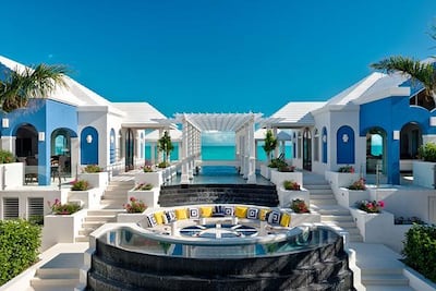 The central table and stairs in the deck area light up at night
