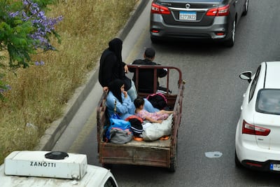 Vehicles backed up on the motorway as people leave Beirut's southern suburbs. EPA
