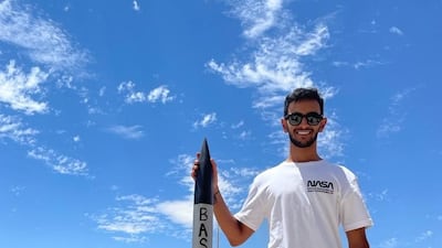 Sultan Baslaib, a student at Khalifa University, displays the rocket he built during an education programme in the US.