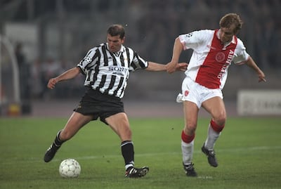 Zinedine Zidane of Juventus, left, in action against Ajax midfielder Richard Witschge during the 1997 Champions League semi-final in Turin. Getty Images