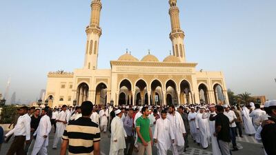 People arriving for the Eid Al Fitr morning prayer at Zabeel Mosque in Dubai. Pawan Singh / The National