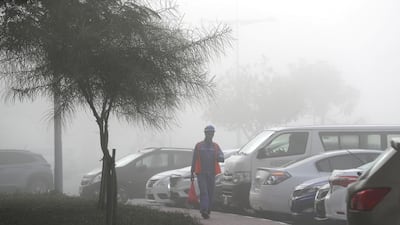 Early morning fog in Discovery Gardens area in Dubai. Pawan Singh / The National