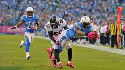The San Diego Chargers, in blue, are in a spot of bother. Eric Bakke / AP Photo