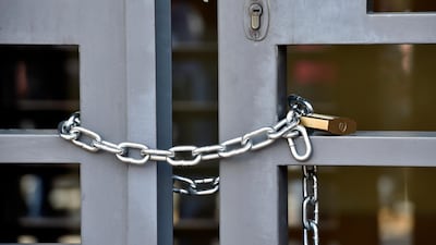 The main entrance building of the Lebanese Association of Banks locked with a chain by anti-government protesters during ongoing protests against the banks' policies and the government in downtown Beirut, Lebanon. EPA