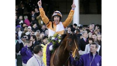 Frankie Dettori celebrates after riding Dangerous Midge to victory in the Breeders' Cup Turf.