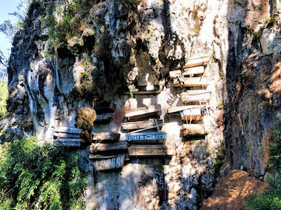 The hanging coffins of Sagada in the Philippines are one part intriguing, one part eerie. Courtesy flickr / Dan Lunberg