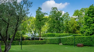 Lush green volleyball court. Courtesy Chateau De Tourreau