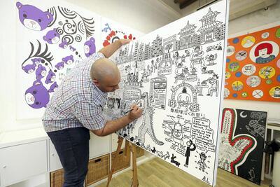 Artist Abdulla Lutfi has created five artworks for Etihad's showcase of Emirati talent, as part of its celebrations for the UAE's 50th anniversary. Photo: Chris Whiteoak / The National