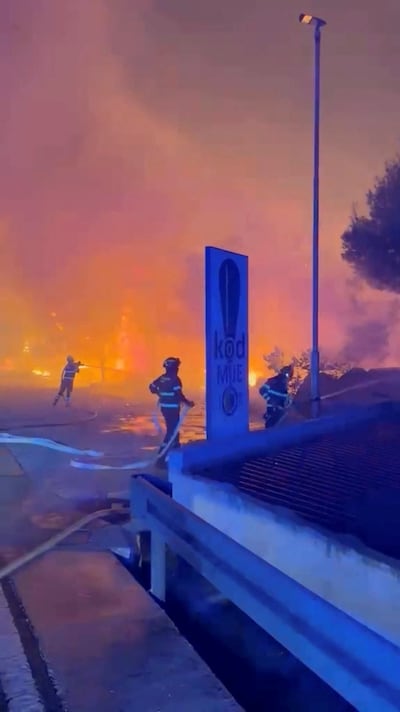 Firefighters battle a wildfire in Omis, Croatia. Reuters