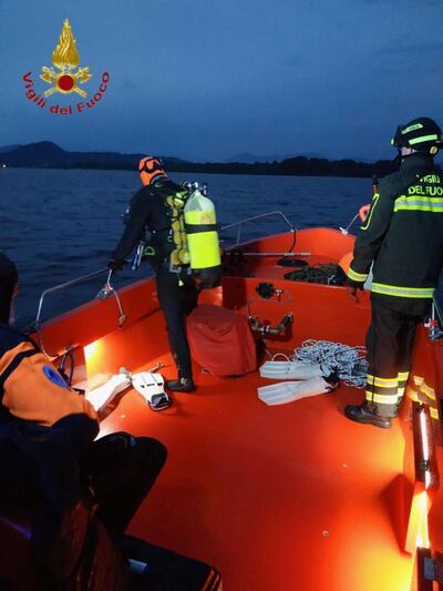 Divers during a search and rescue operation in Lake Maggiore. EPA