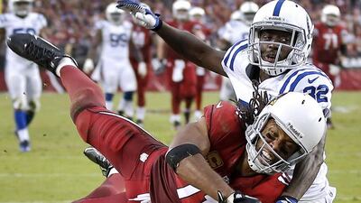 Arizona Cardinals wide receiver Larry Fitzgerald has not seen his production slow down despite catching passess from a succession of different quarterbacks. Matt York / AP Photo