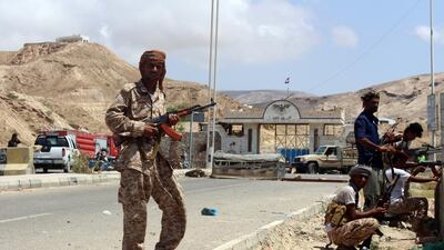 Yemeni soldiers stand guard in the southeastern Yemeni port of Mukalla (AFP Photo / Stringer)