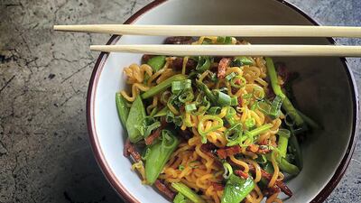 A dish of indomie from 3fils - one of the 600 restaurants listed on DeliverDXB.