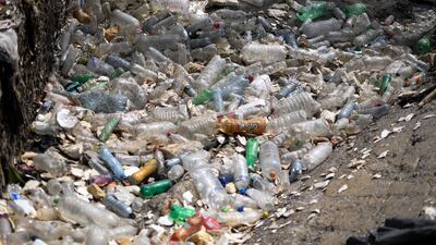 Plastic bottles pile up on the banks of the polluted Las Vacas River, in Chinautla, Guatemala. AFP