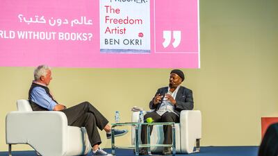 Ben Okri (right) speaking at the Abu Dhabi Dhabi International Book Fair on Saturday. Courtesy DCT