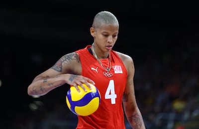 With her shaved head and tattoos, Melissa Teresa Vargas of Turkey stands out in women's volleyball. Reuters