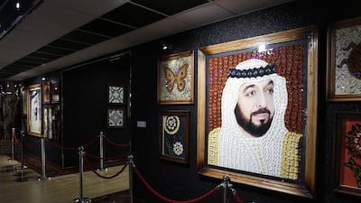 A portrait of Sheikh Khalifa, President of the UAE, made entirely from butterflies, on display at the garden. Antonie Robertson / The National