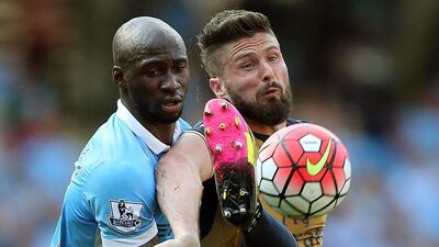 Arsenal’s Olivier Giroud (R) fights for the ball with Eliaquim Mangala (L) of Manchester City during the Premier League match between Manchester City and Arsenal at the Etihad Stadium, Manchester, Britain, 8 May 2016. Nigel Roddis / EPA