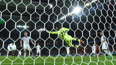 Denis Glushakov of Russia scores his sides first goal during the UEFA EURO 2016 Group B match between Russia and Slovakia at Stade Pierre-Mauroy on June 15, 2016 in Lille, France. (Photo by Matthias Hangst/Getty Images)