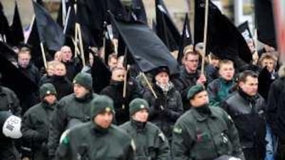 Right-wing demonstrators take part in a march to commemorate the 64th anniversary of the Allied bombing of Dresden.