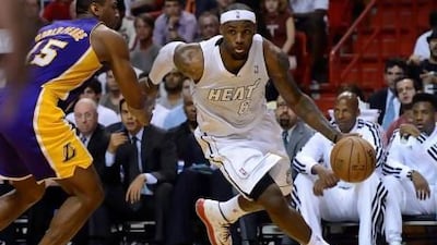 Miami Heat forward LeBron James, right, is shooting a career-high 56 per cent this season and is prime form as the Heat prepare to defend their NBA title. Rhona Wise / EPA