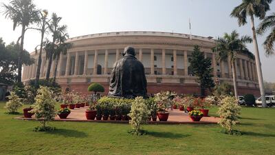 A general view of the statue of Mahatma Gandhi overlooking the Indian Parliament House in New Delhi. EPA