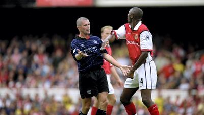 Roy Keane of Manchester United clashes with Patrick Vieira of Arsenal during a Premier League match in 1999. Getty Images