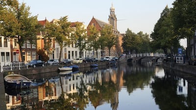 Leiden University’s canalside Academy Building looms in the background in Leiden, Netherlands. The university has offered studies in Arabic for the past 400 years. Tim Draper
