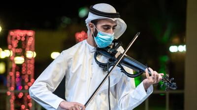 Violinist Anas Zuhri playing traditional Arab music.